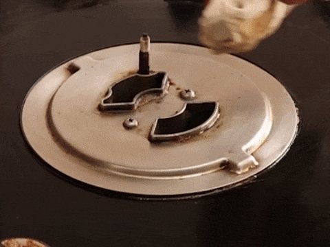 The same stove burner plate wiped clean