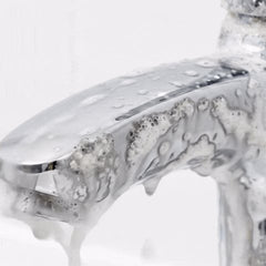 Bathroom Cleaner foam on a tap